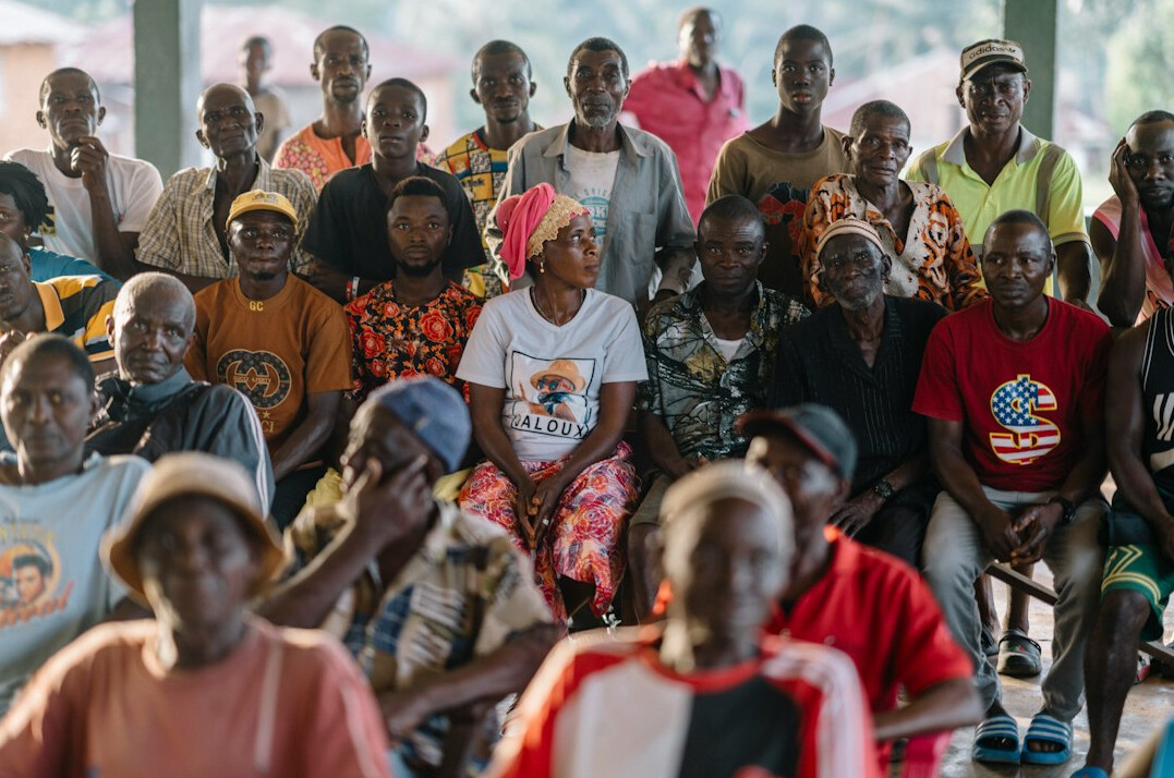 people in community meeting